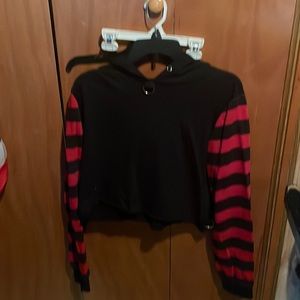 Black cropped hoodie with red and black stripped sleeves
